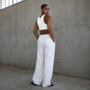 Chesham zip front sports bra — Support Layers by WFXC. worn by a model.