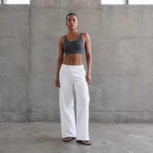 Flintfield zip front sports bra — Support Layers by WFXC. worn by a model.