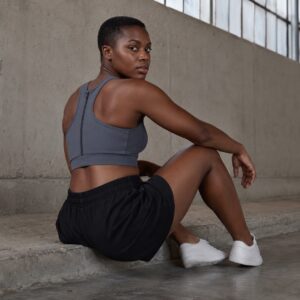 Bellingdon zip front sports bra — Support Layers by WFXC. worn by a model.