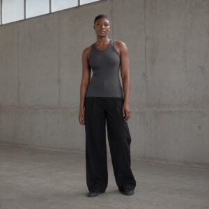 Latimer racer back vest — Vests & Tanks by WFXC. worn by a model.