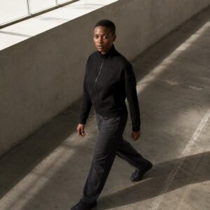 Chesham zip through track top — Zip Tops by WFXC. worn by a model.