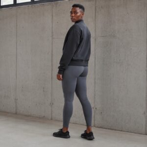 Latimer zip through track top — Zip Tops by WFXC. worn by a model.
