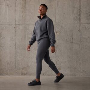 Codmore half zip sweatshirt — Zip Tops by WFXC. worn by a model.